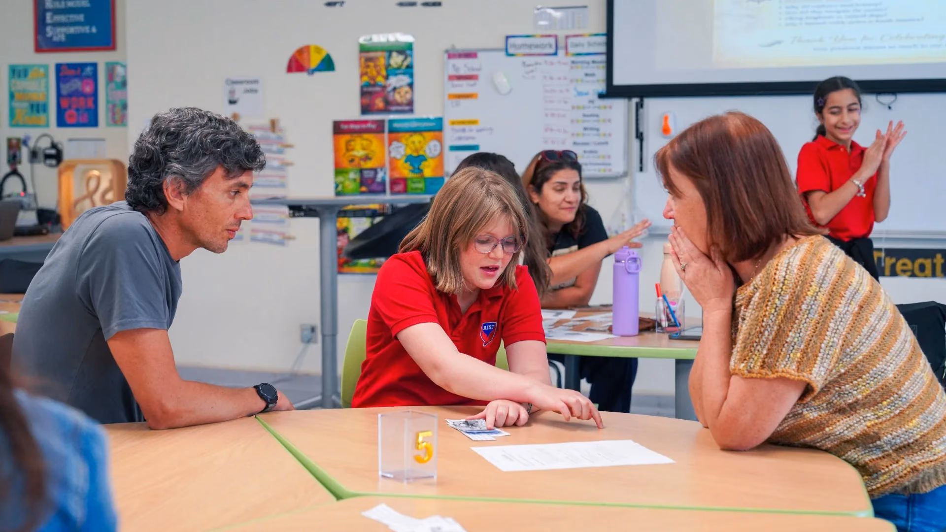 AISJ Elementary students learning with their teacher