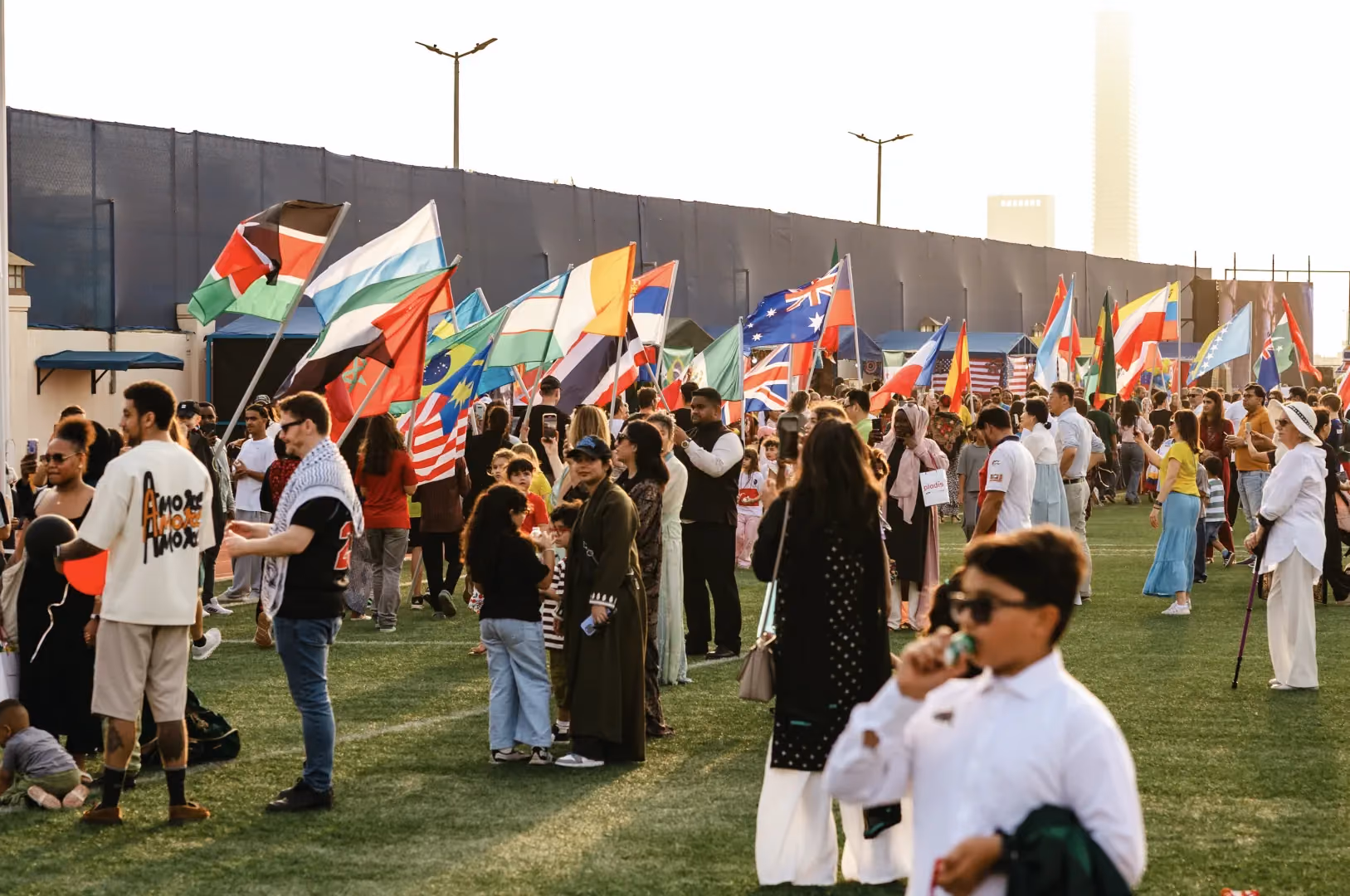 Students cheering at AISJ International Day.